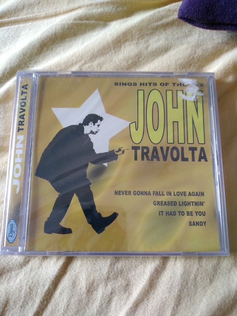John Travolta Sings